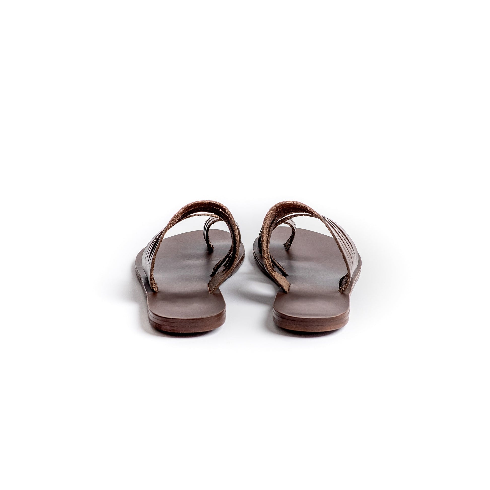 Back view of Helen slide on flats for women in brown against a white background.