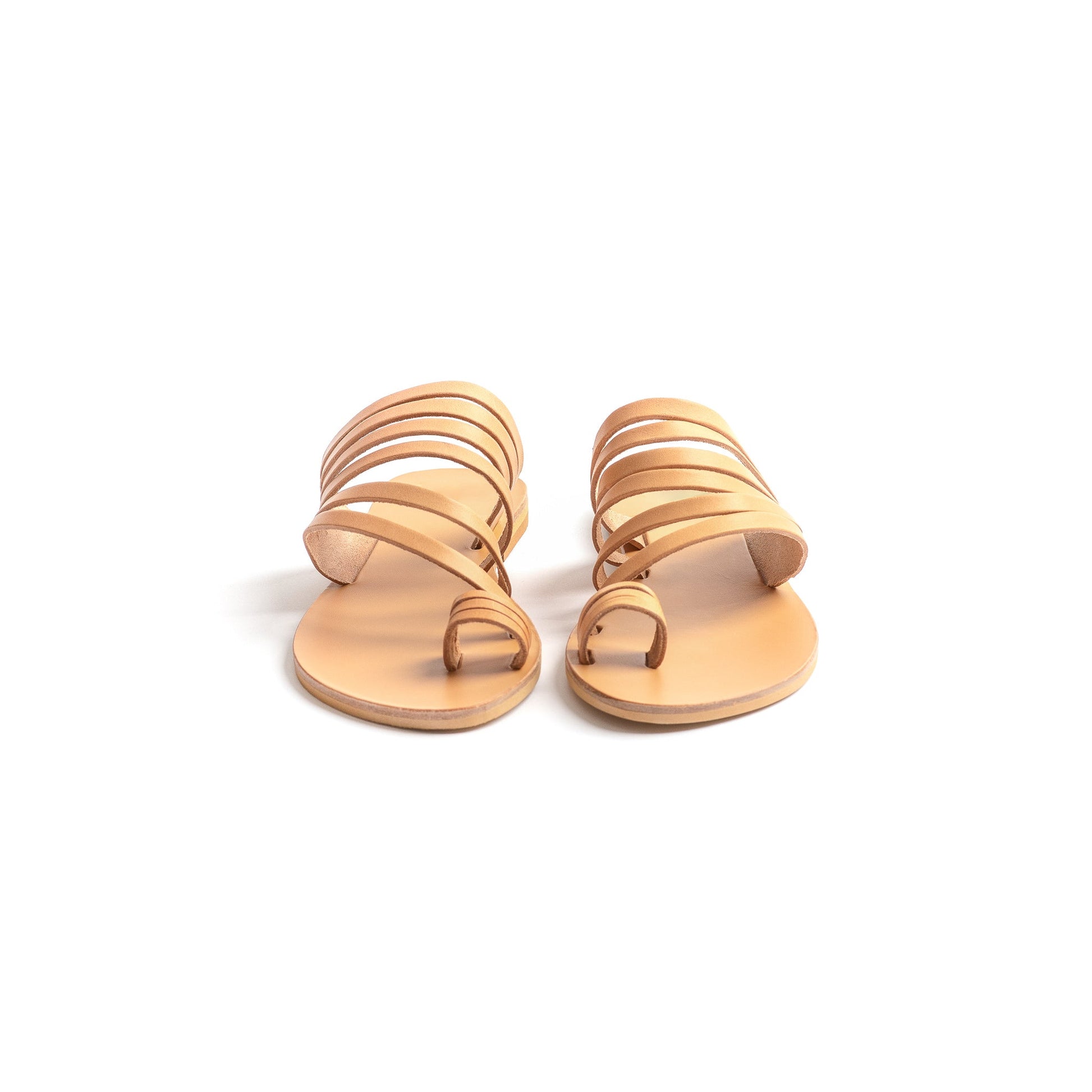 Front view of Helen slip on flats womens in tan leather against a white background. They are flat slippers for women.